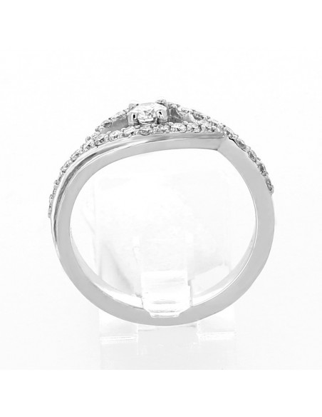 Bague or et diamant Regard. Diamant central avec entourage serti - or 18 carats.