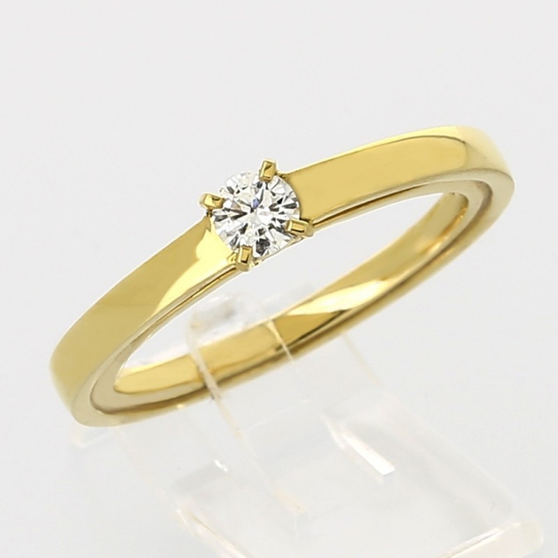 Solitaire double anneaux montée d'un diamant serti 4 griffes en or 18 carats Solitaire double anneaux montée d'un diamant serti 4 griffes en or 18 carats