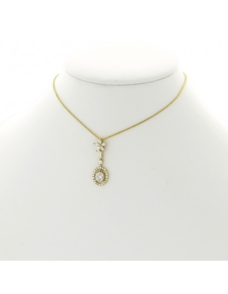 Pendentif or 18 carats, motif floral en diamant (0,78 carat total)