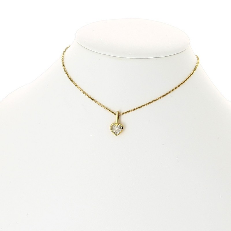 Collier pendentif coeur femme 1 diamant serti en clos pour un poids de 0,67 carat, avec bélière, en or 18 carats