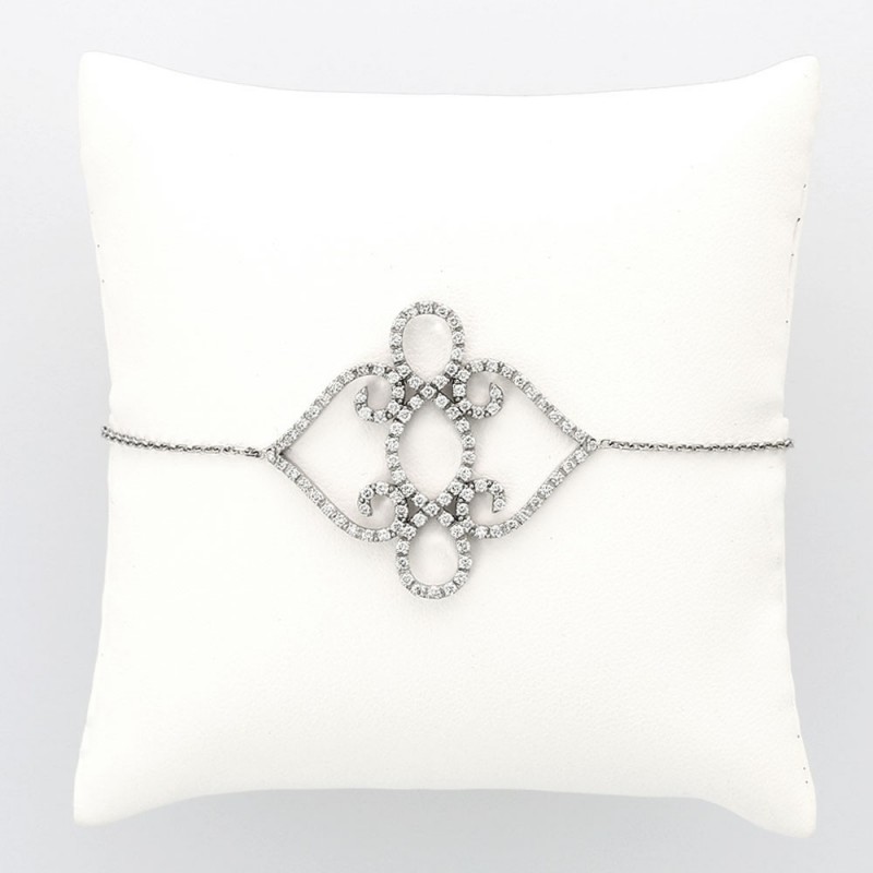 Bracelet motif volute pavé serti mini griffes diamants 1,06 carat-or 18 carats