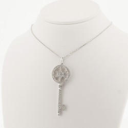 Pendentif clé avec motif étoile pavée de diamants en or 18 carats