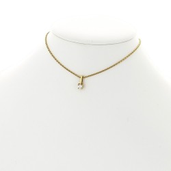 Pendentif diamant serti 4 griffes bélière sur chaine en or 18 carats