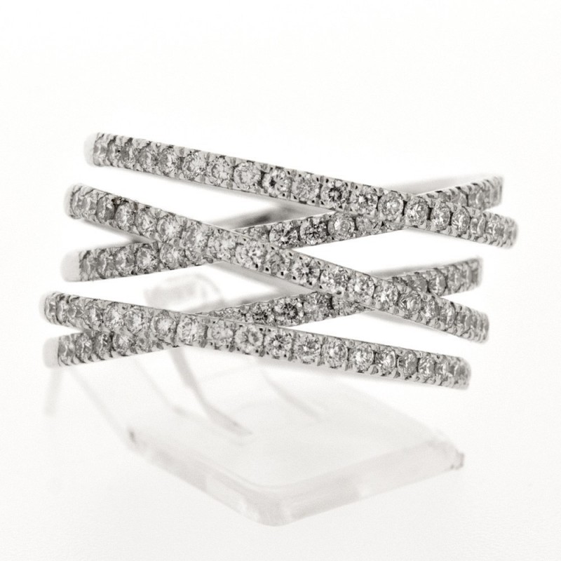 Bague original à multiples anneaux entrecroisés pavés de diamants sertis mini-griffes en or 18 carats