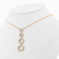 Pendentif 4 cercles mobiles pavés de diamants sertis grains en or 18 carats