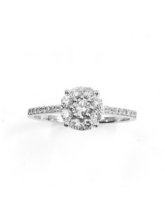 Solitaire illusion Domina. modèle réhaussé avec un diamant central de 0,10 ct - or 18 carats.