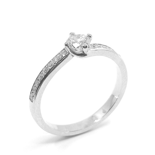 Solitaire or et diamants Tourbillon. Chaton torsadé avec un diamant de 0,28 ct et corps serti de diamants - or 18 carats