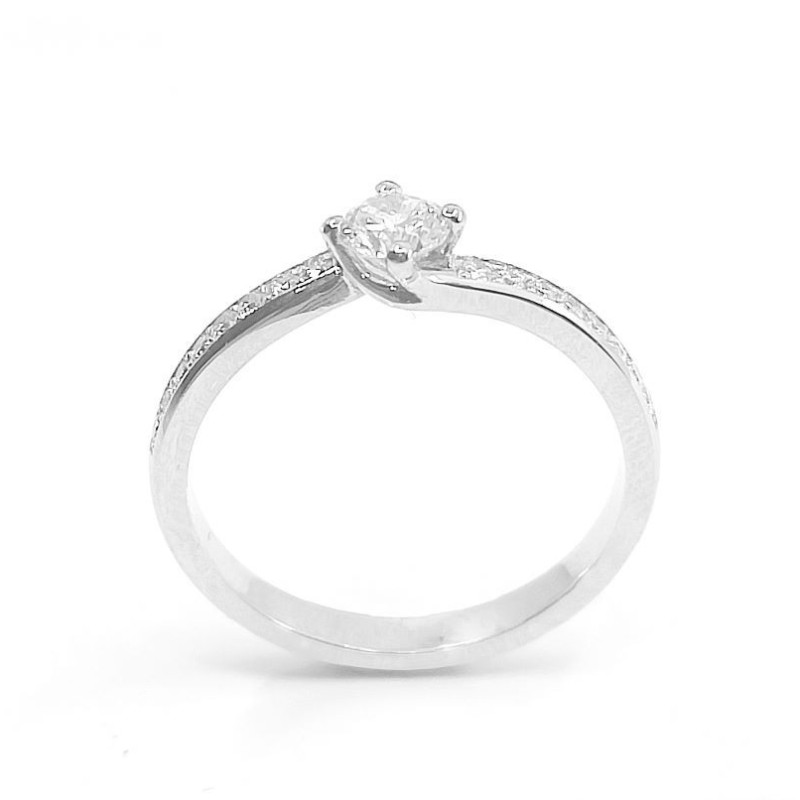 Solitaire or et diamants Tourbillon. Chaton torsadé avec un diamant de 0,28 ct et corps serti de diamants - or 18 carats