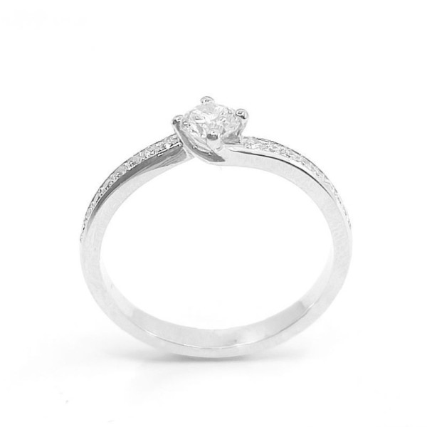 Solitaire or et diamants Tourbillon. Chaton torsadé avec un diamant de 0,28 ct et corps serti de diamants - or 18 carats