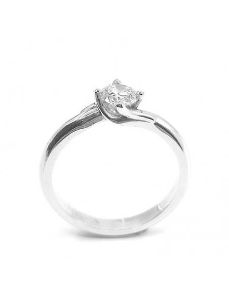 Solitaire or et diamant tourbillon, 1 diamant de 0,29 ct  serti sur chaton 4 griffes - or 18 carats